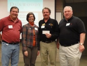 Mike Beck, Karen Conroy, Greg Johnson present check to WITC's Kevin Lipsky